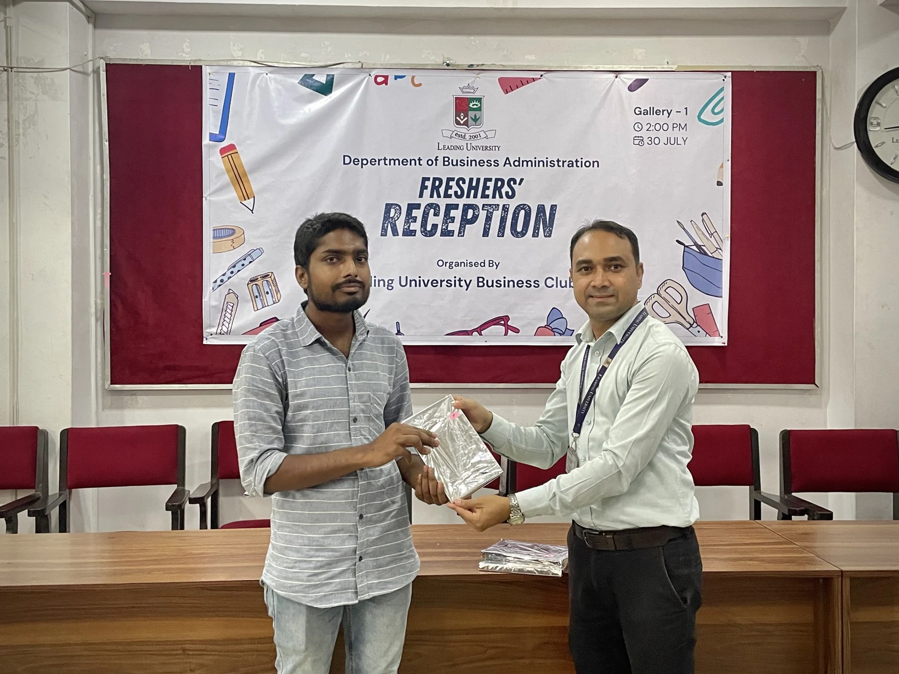 Receiving first prize in the quiz competition at the Department of Business Administration’s Freshers’ Reception, Leading University, in 2023.